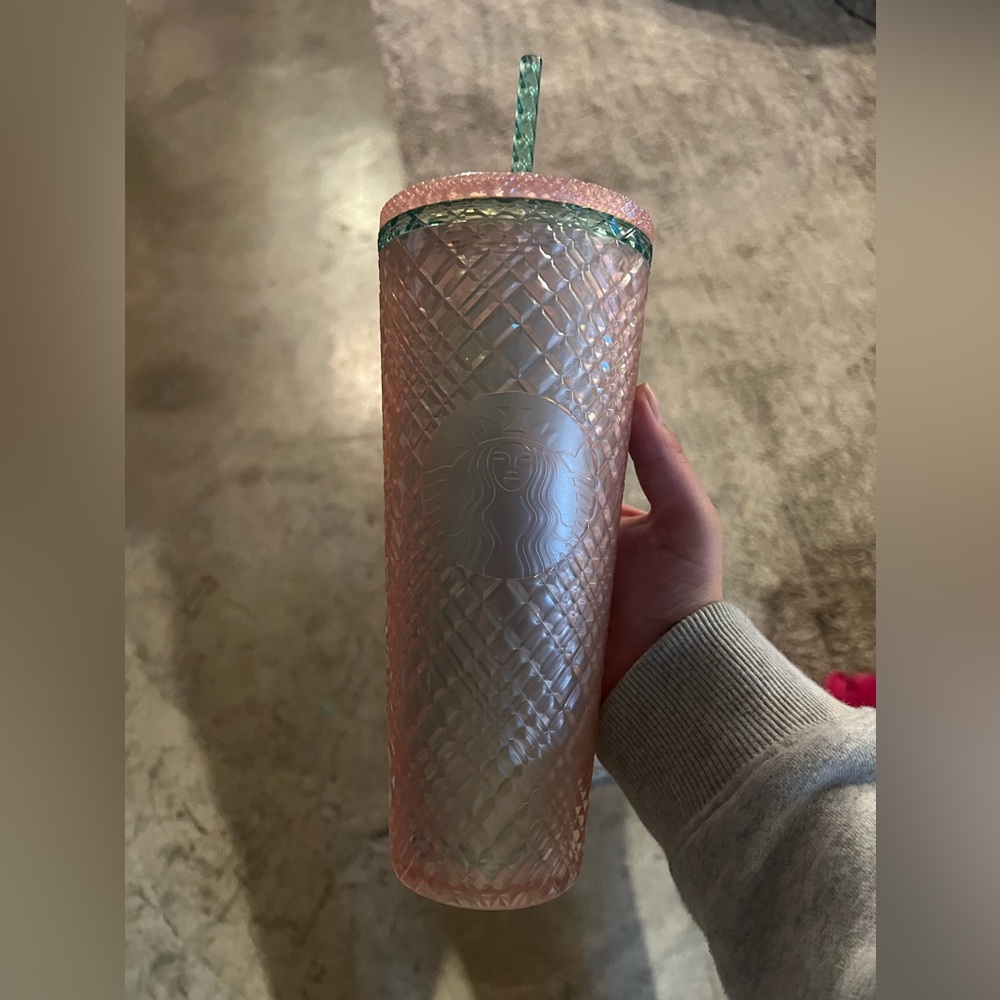Cute baby pink and light green Starbucks tumbler that color schemes with wicked